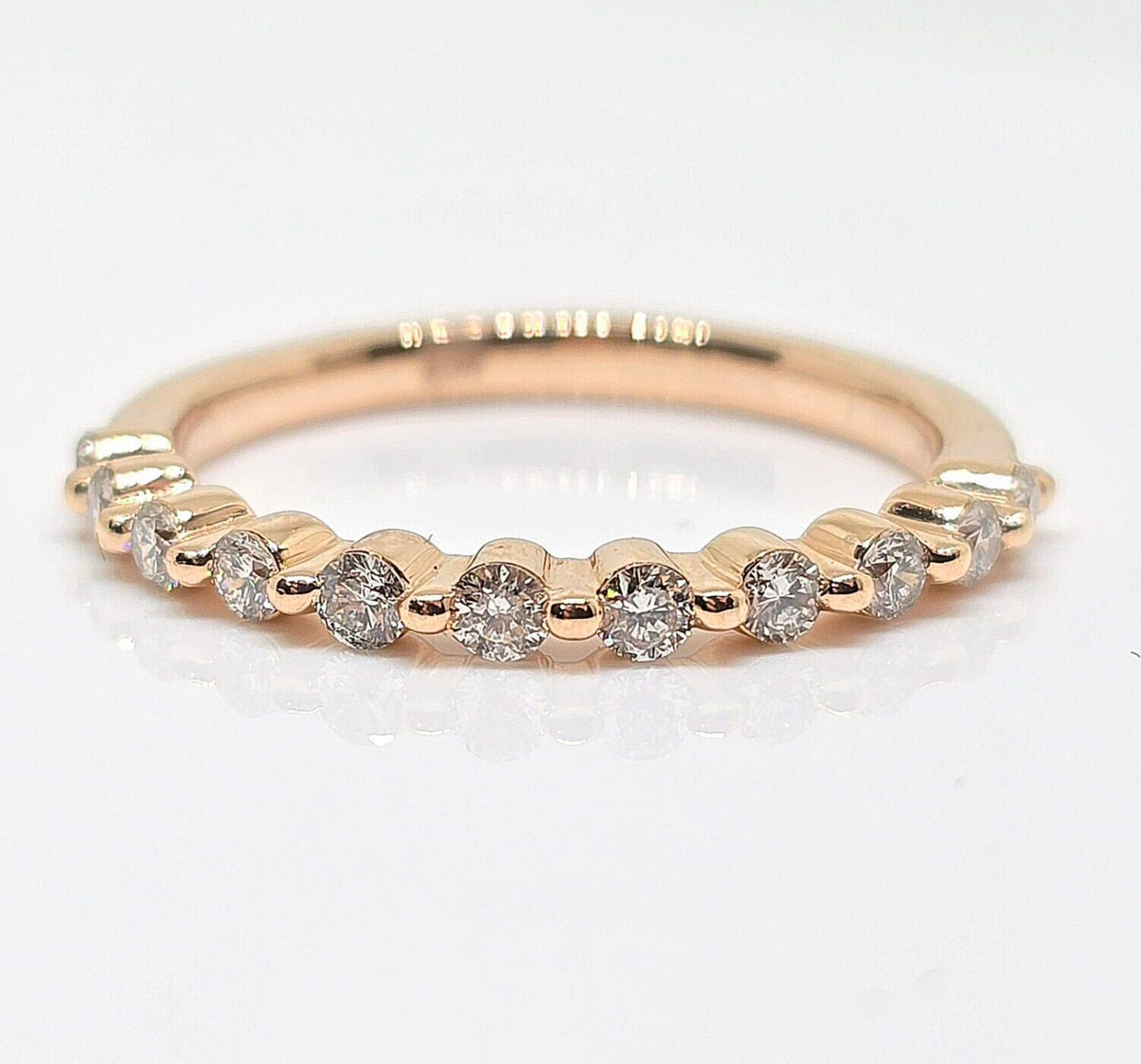 14K gold shared prong diamond wedding band