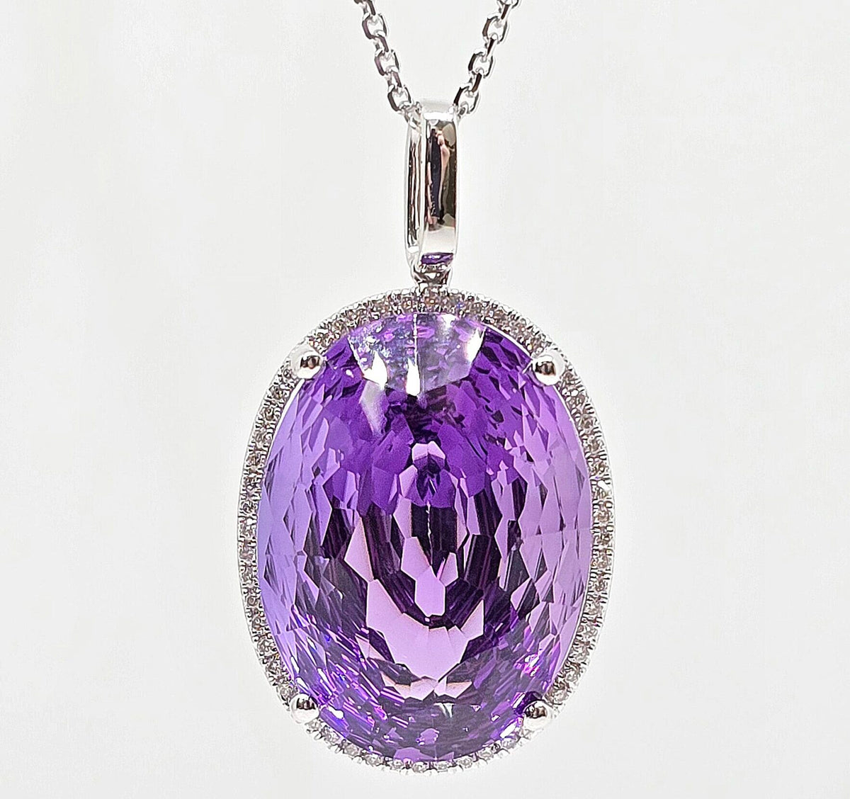 14K gold amethyst necklace with diamond halo