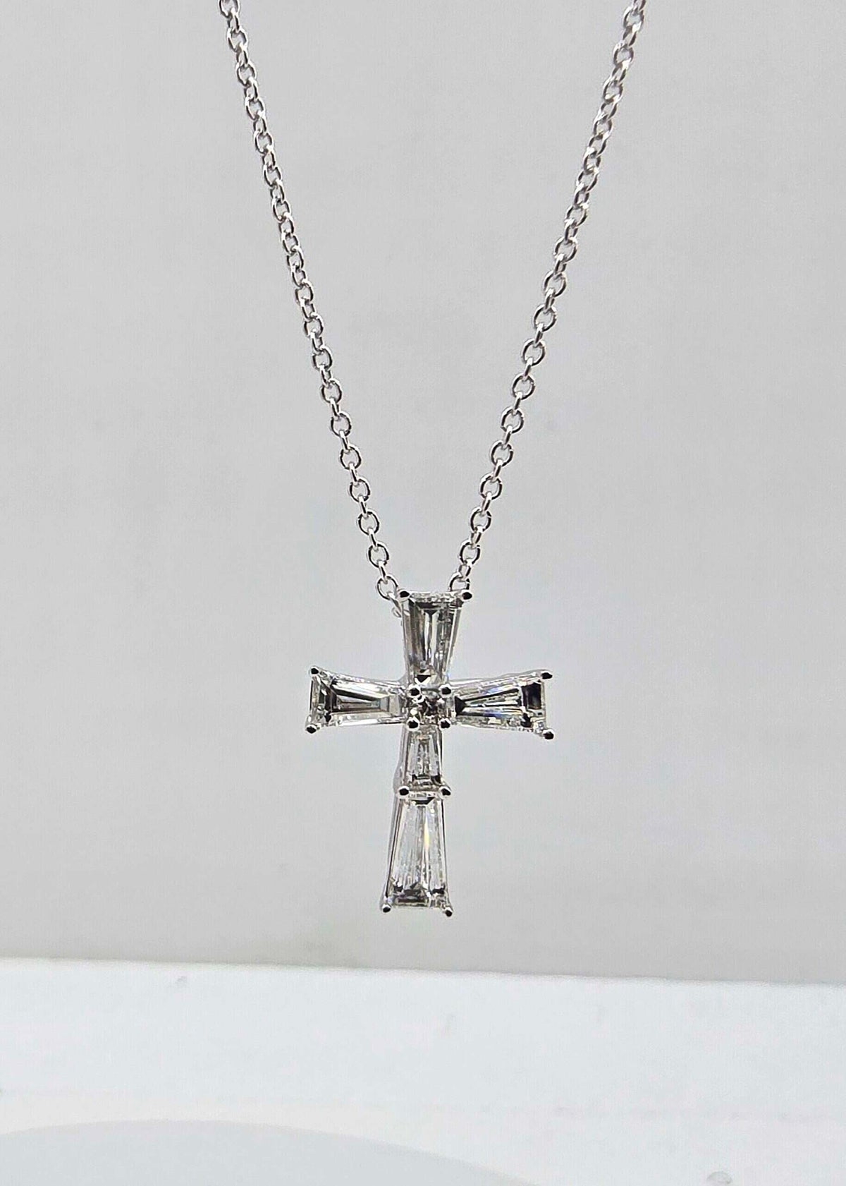 14K gold tapered baguette diamond cross pendant