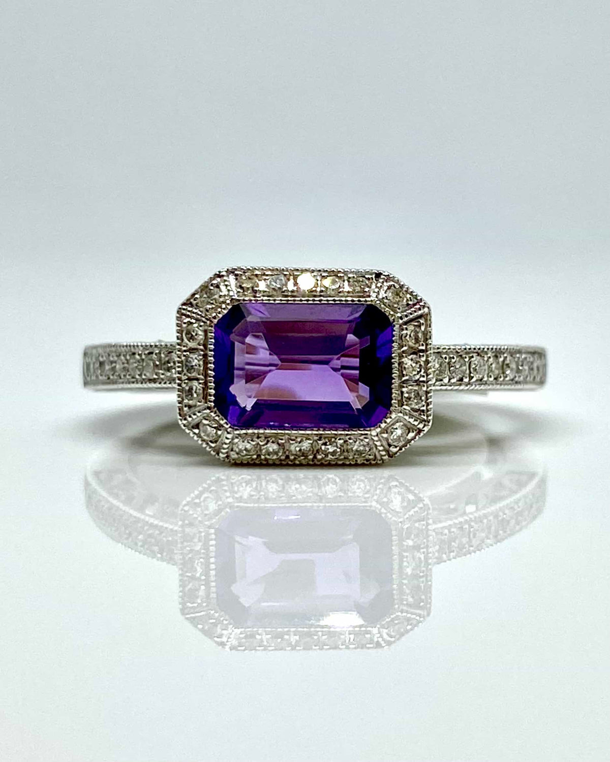 14K white gold emerald cut amethyst ring with diamond halo
