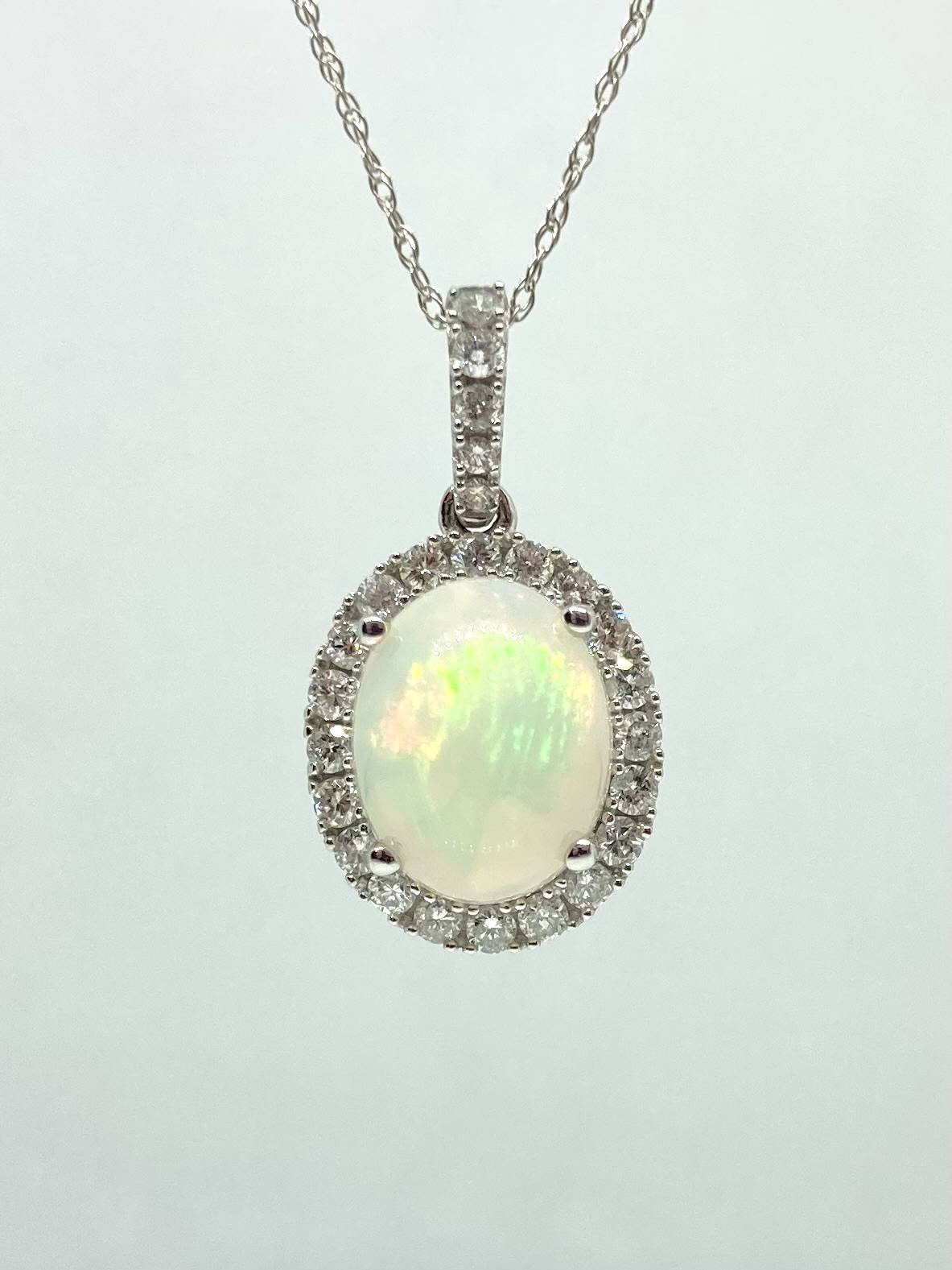 14K white gold jelly opal necklace with diamond halo