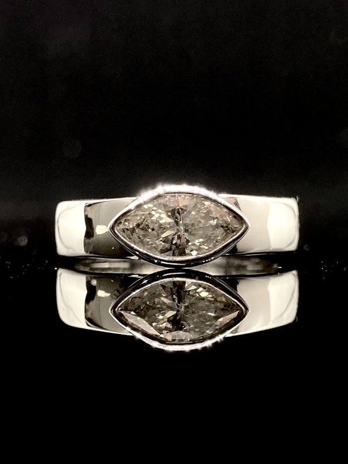 Pear ruby swirl ring