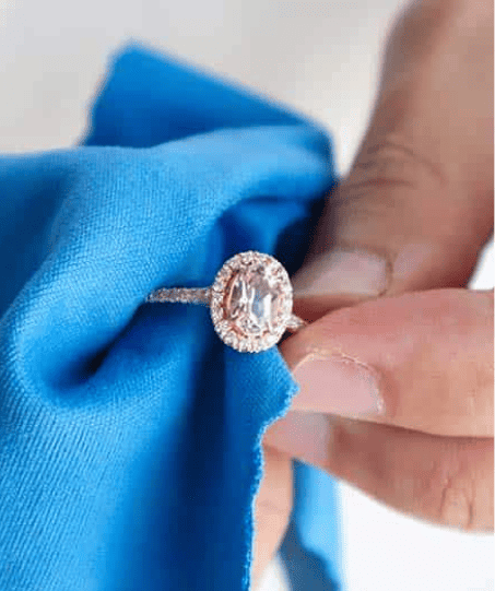 Pear ruby swirl ring