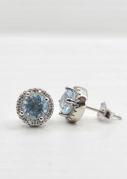 Sterling silver blue topaz halo earrings
