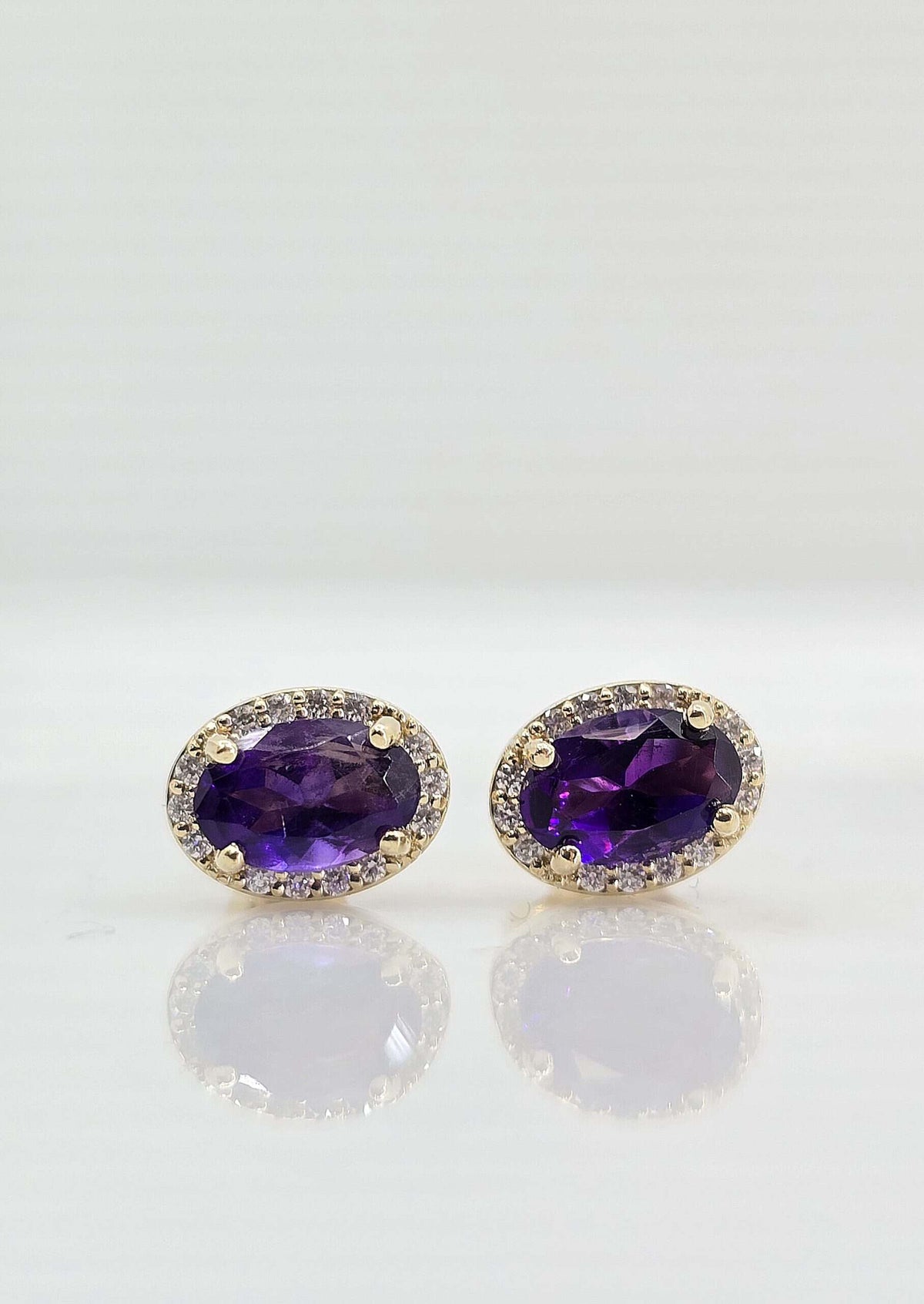 14K gold amethyst and diamond halo earrings