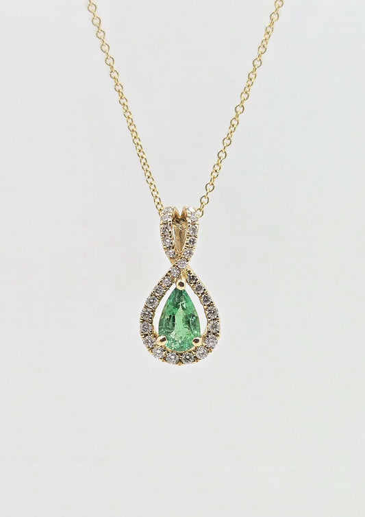 14K gold emerald necklace with diamond halo