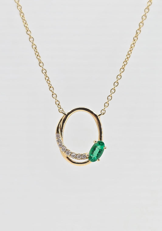 14K gold emerald and diamond station necklace