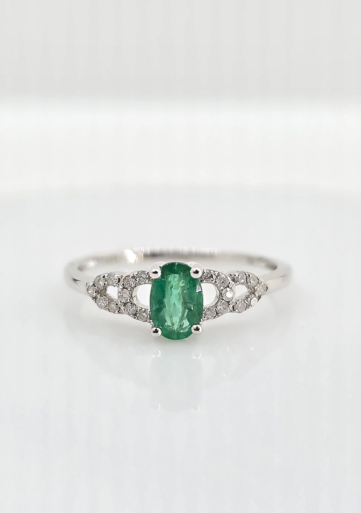 14K gold emerald and diamond ring