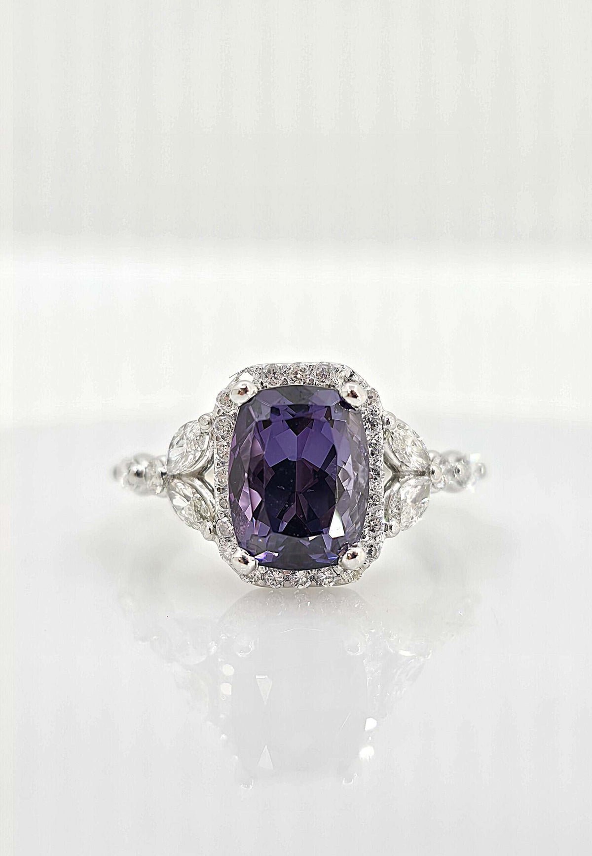Custom platinum spinel and diamond ring