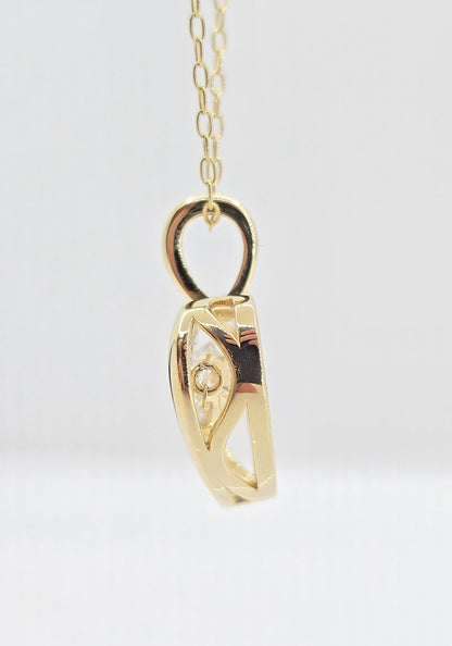Gold plated sterling silver lab grown diamond heart movement necklace, view 3
