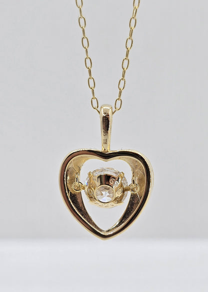 Gold plated sterling silver lab grown diamond heart movement necklace, view 4