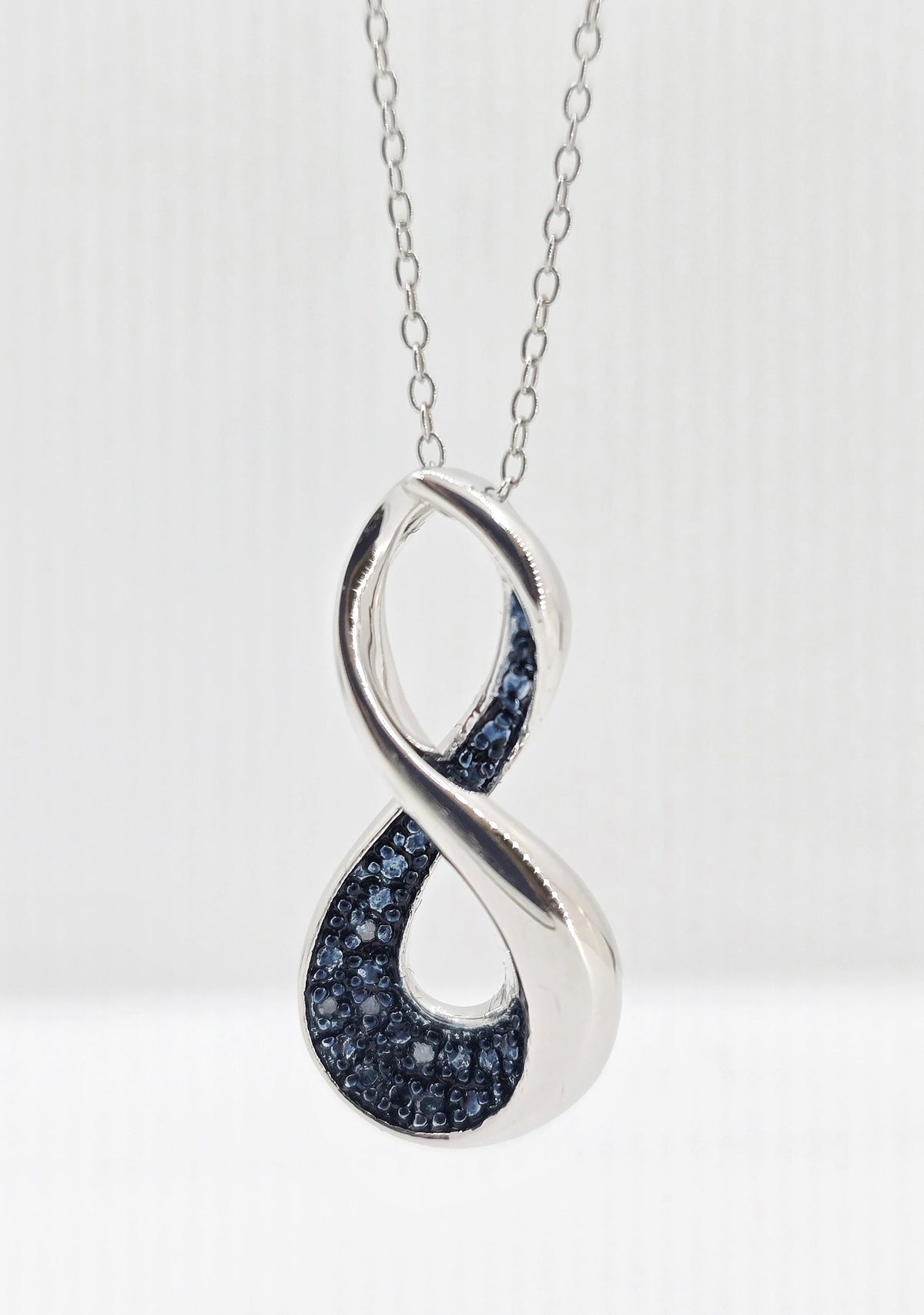 Sterling silver diamond infinity necklace