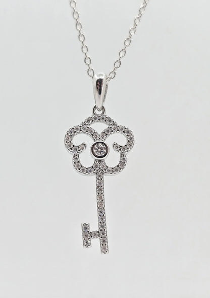 Sterling silver moissanite key necklace