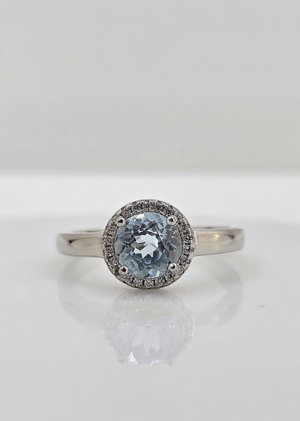 Sterling silver blue topaz ring, style B