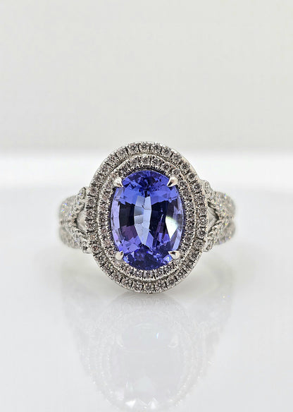 14K gold tanzanite ring with double diamond halo