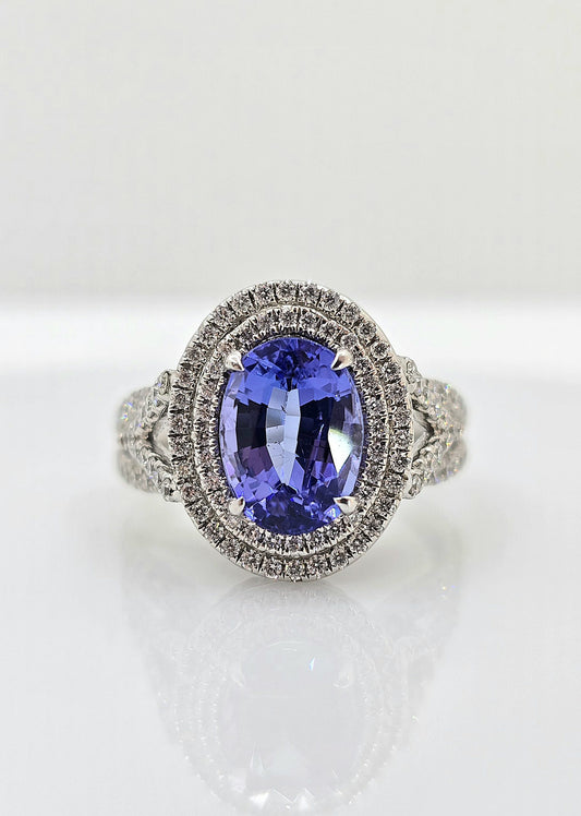 14K gold tanzanite ring with double diamond halo