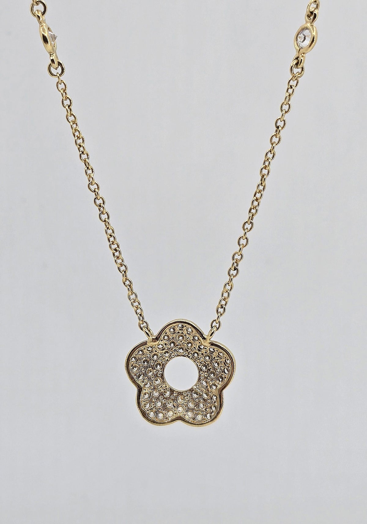 Gold plated cubic zirconia pave flower necklace, view 4