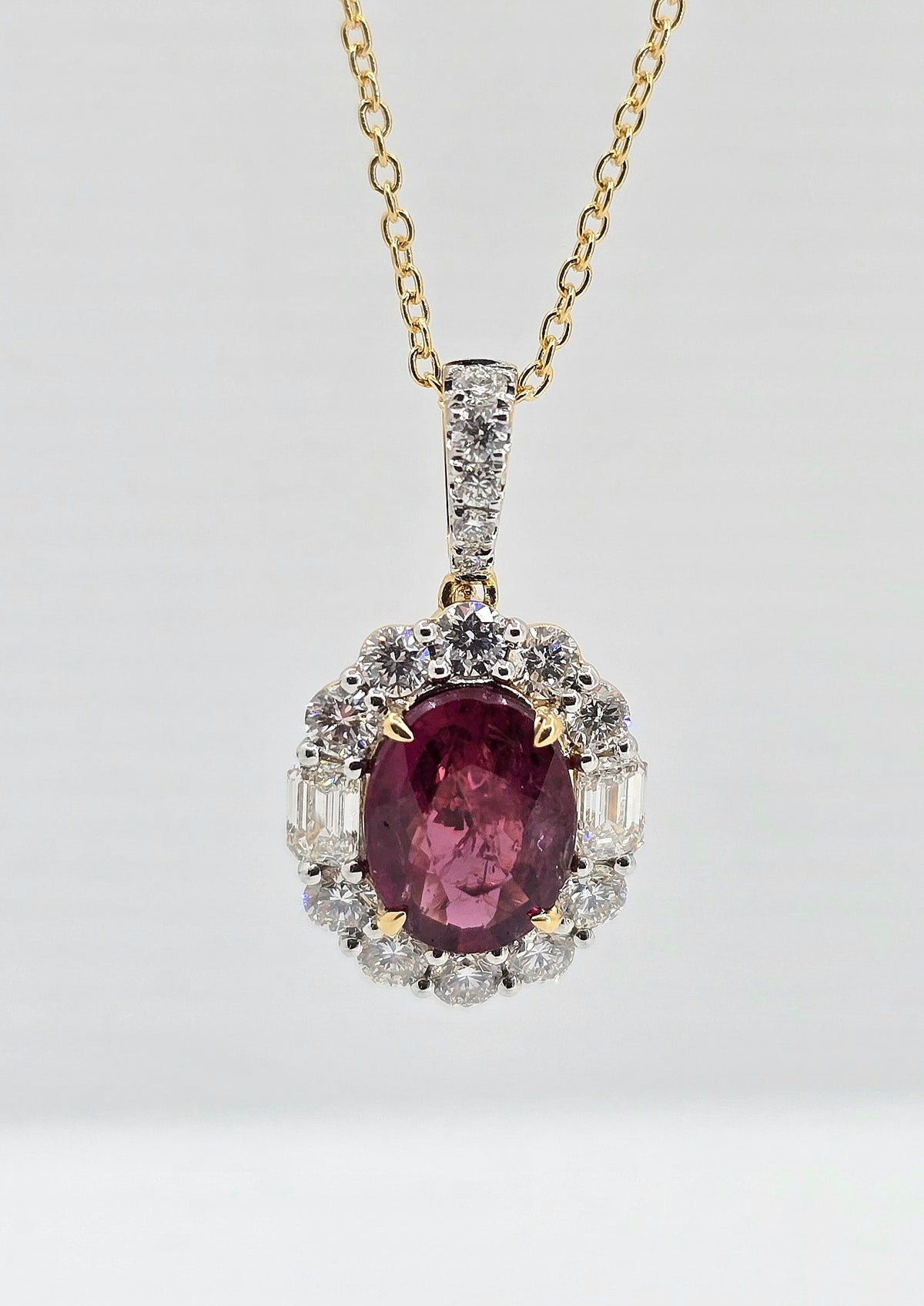 18K gold ruby and diamond halo necklace