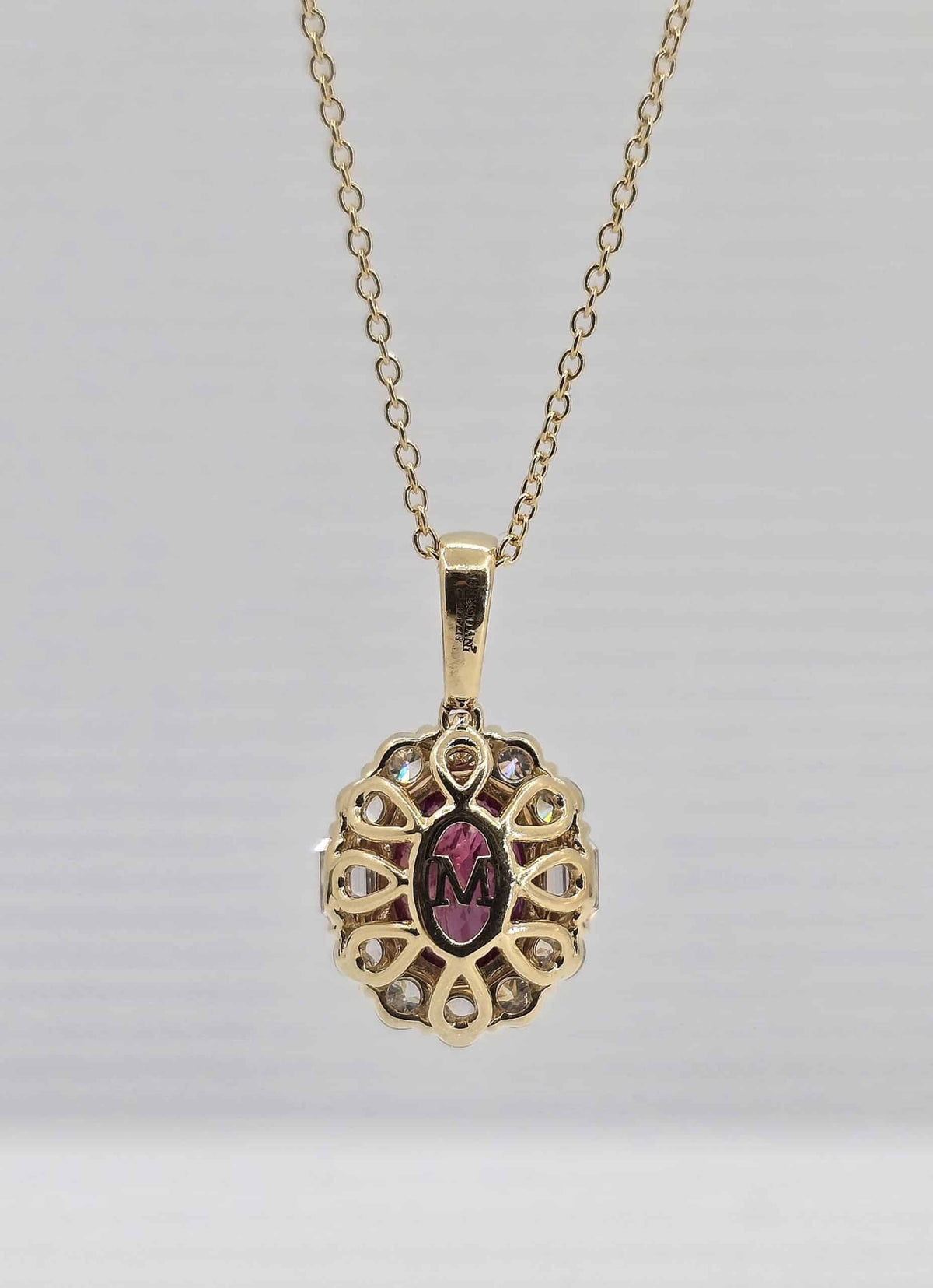 18K gold ruby and diamond halo necklace, view 3