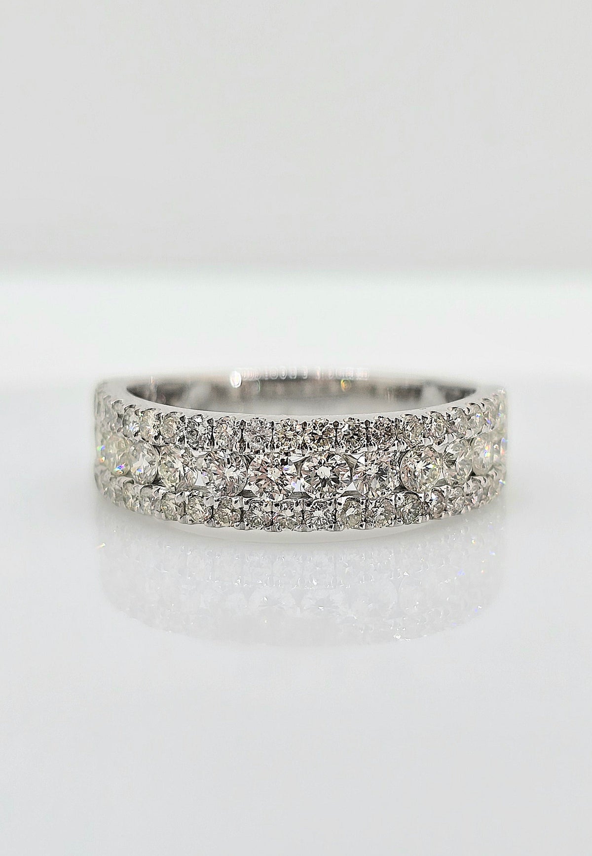 Platinum three row diamond band