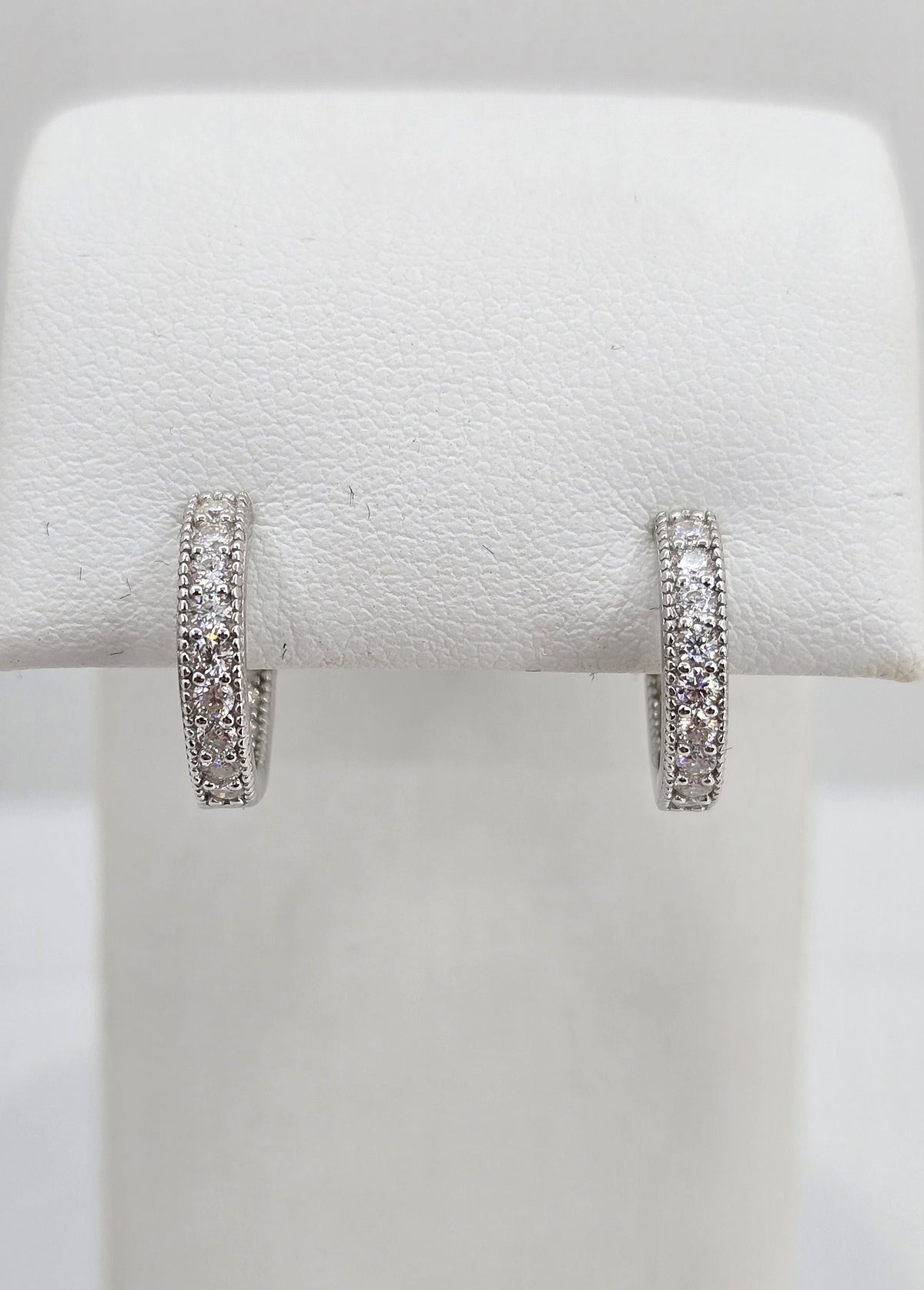 Sterling silver moissanite milgrain huggie earrings