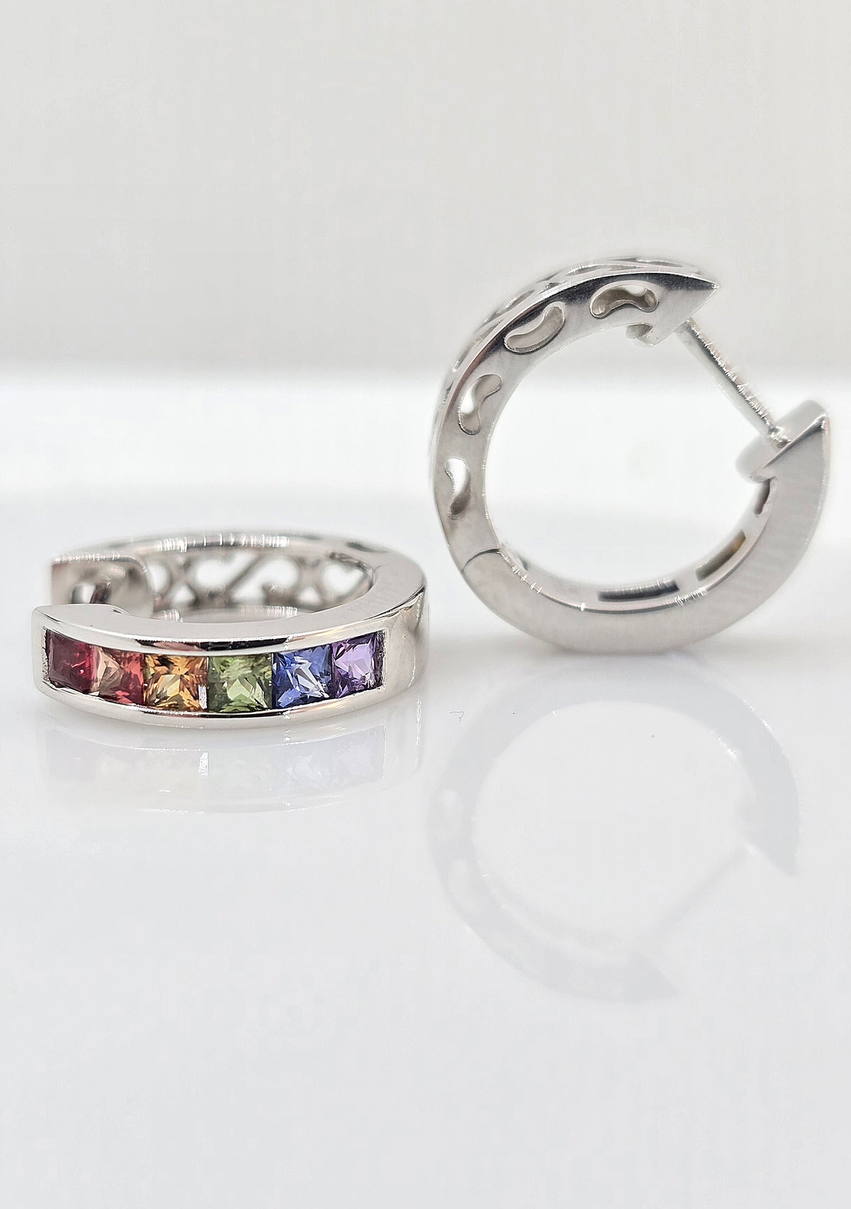 14K gold rainbow sapphire huggie earrings