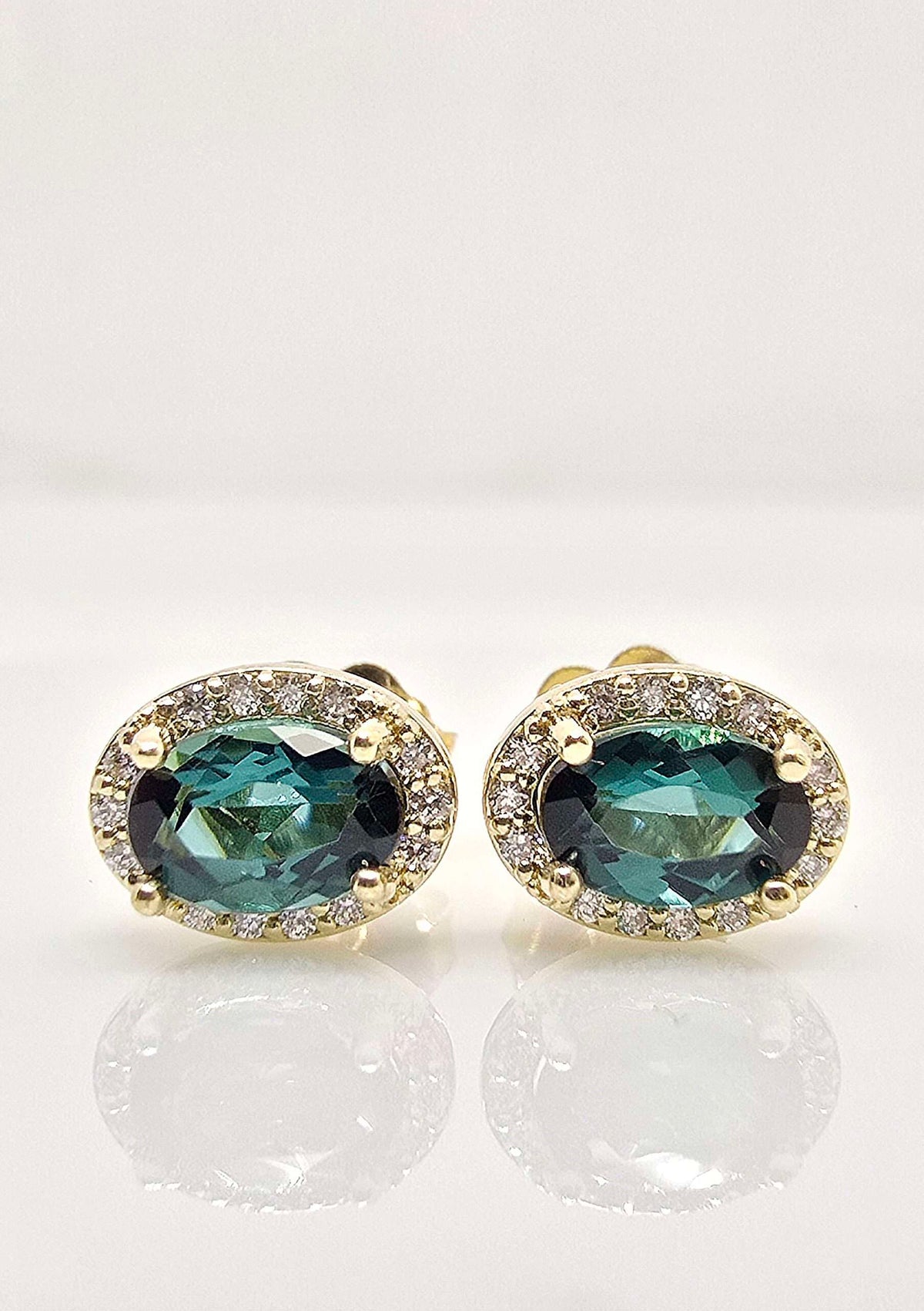 14K gold green tourmaline and diamond halo earrings