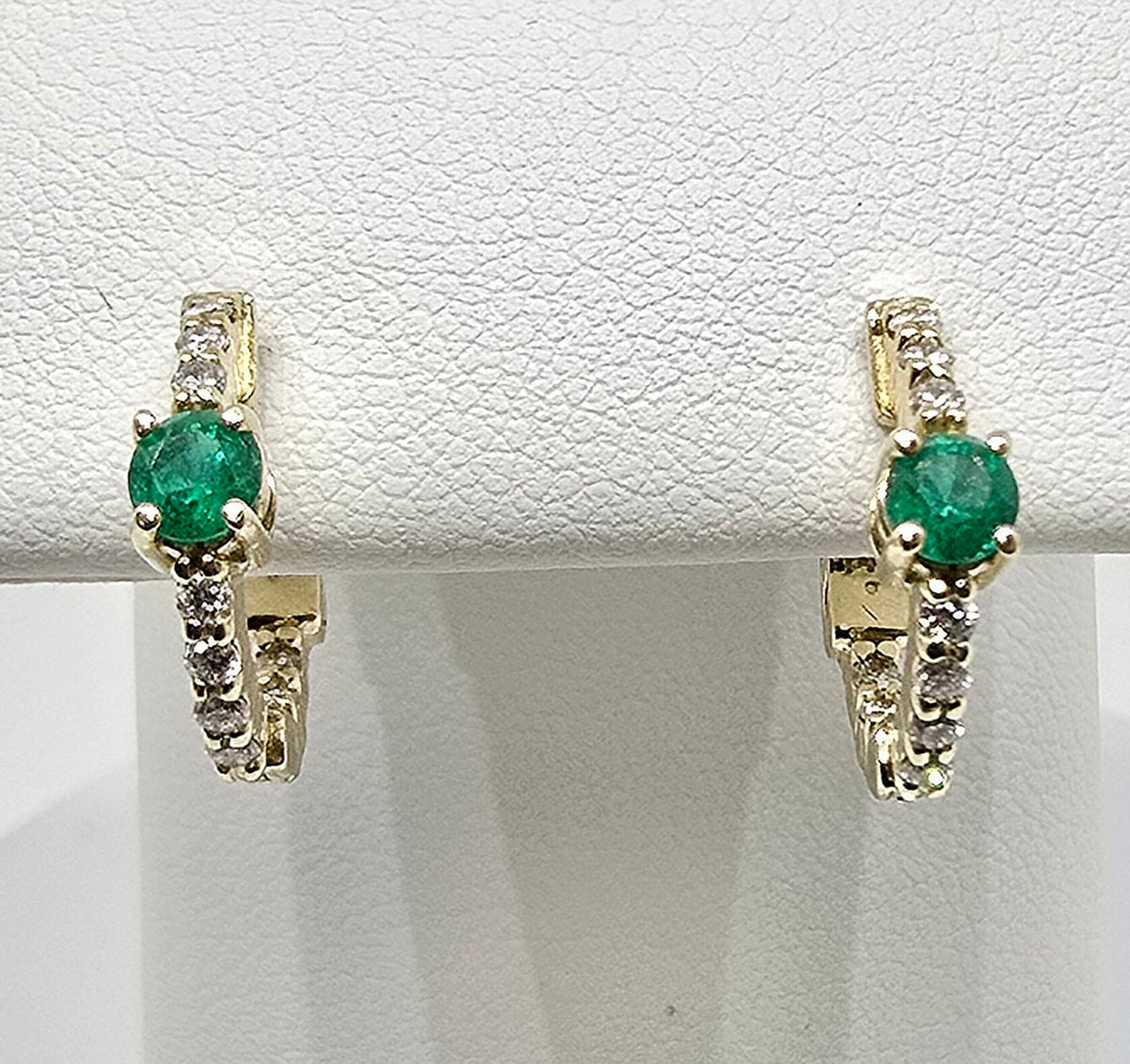 14K gold emerald and diamond huggie earrings