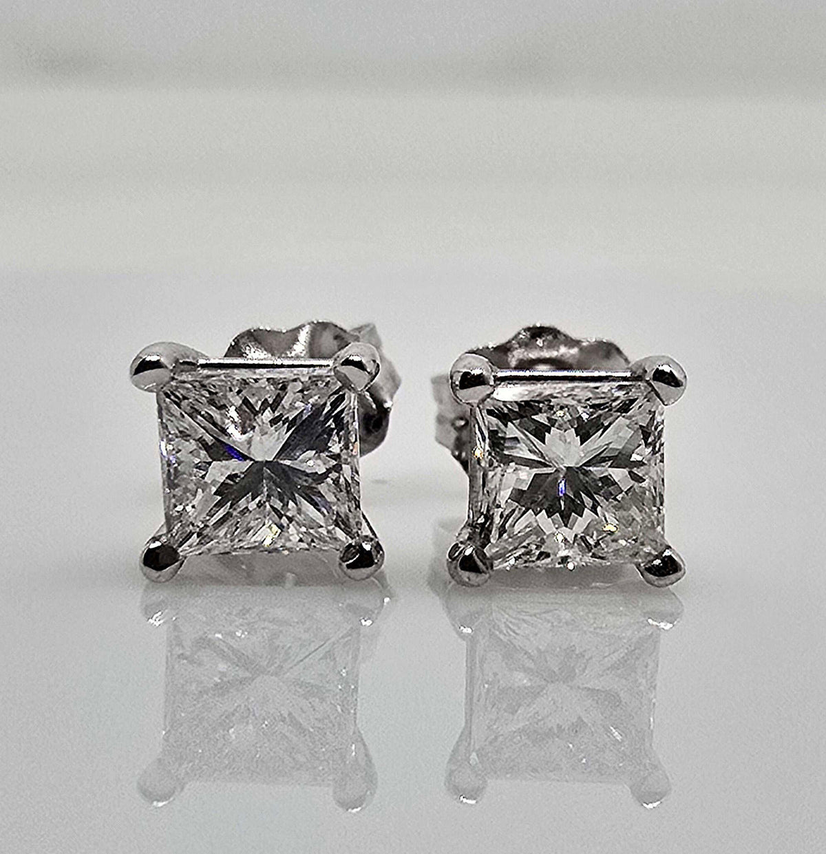 Pre-owned 14K gold princess cut diamond stud earrings