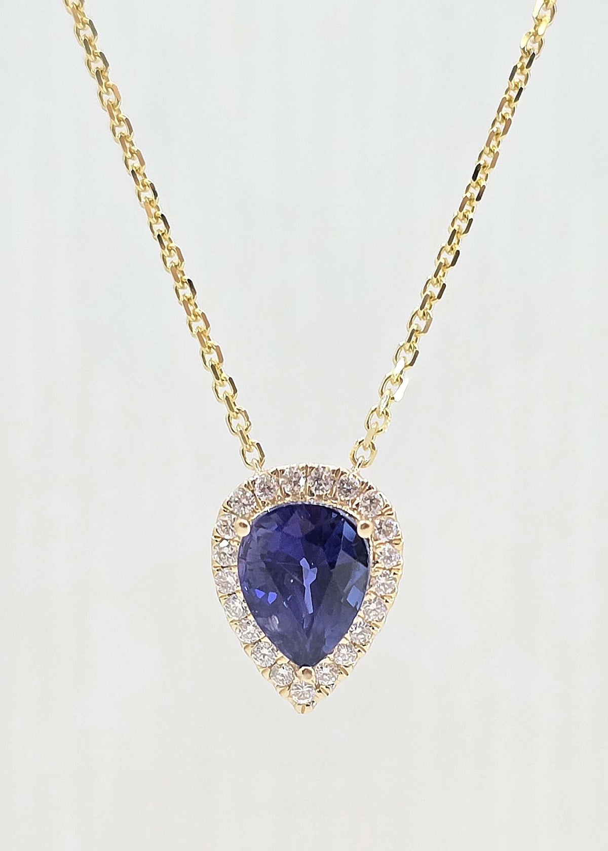 14K gold sapphire necklace with diamond halo