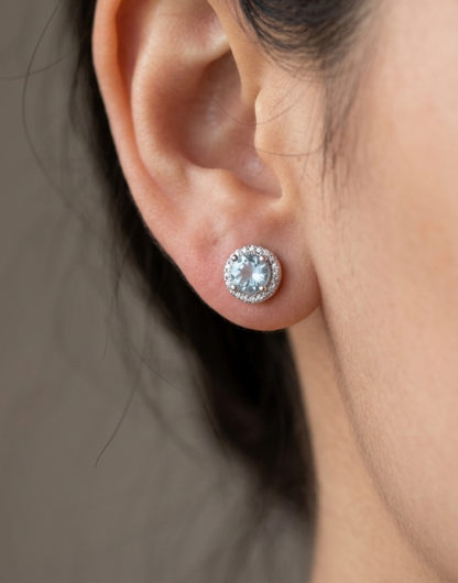 Sterling silver blue topaz halo earrings, view 2