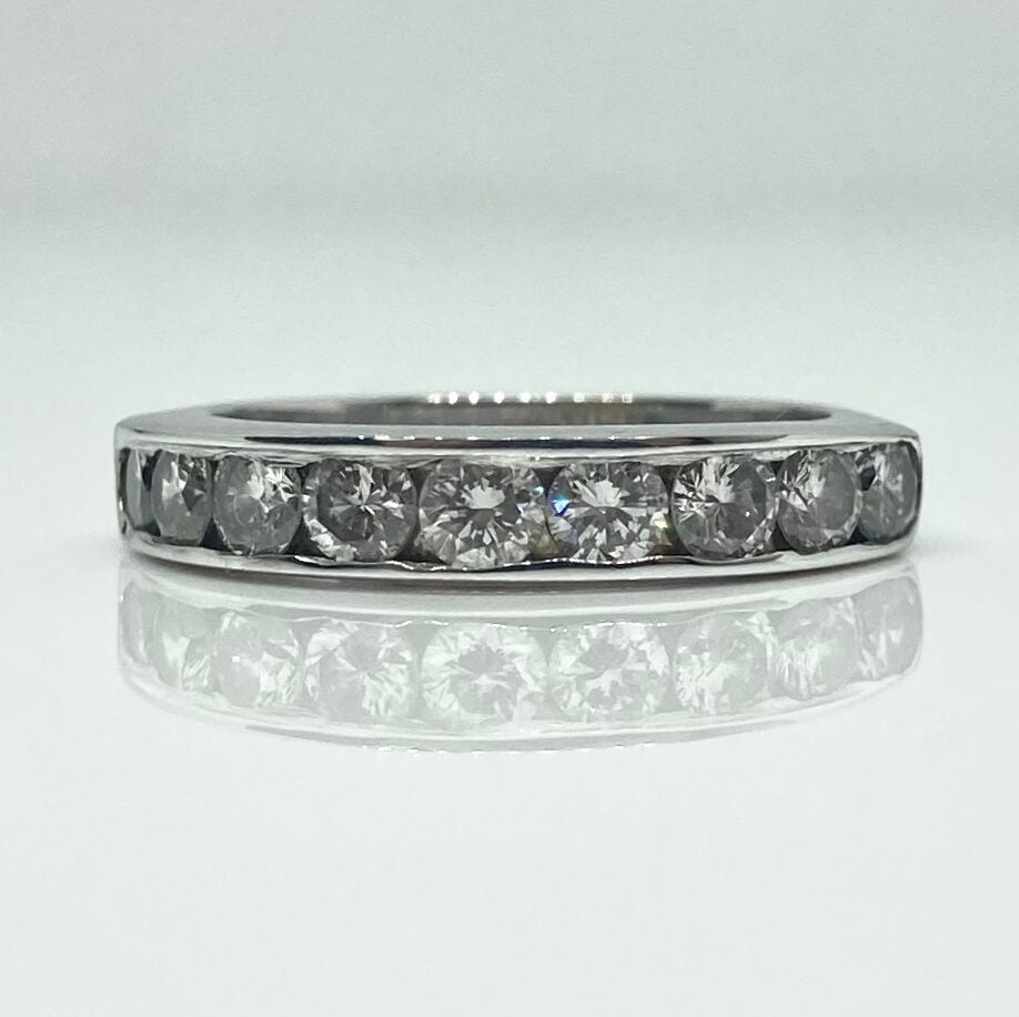 Pre-owned 14K channel set diamond wedding band