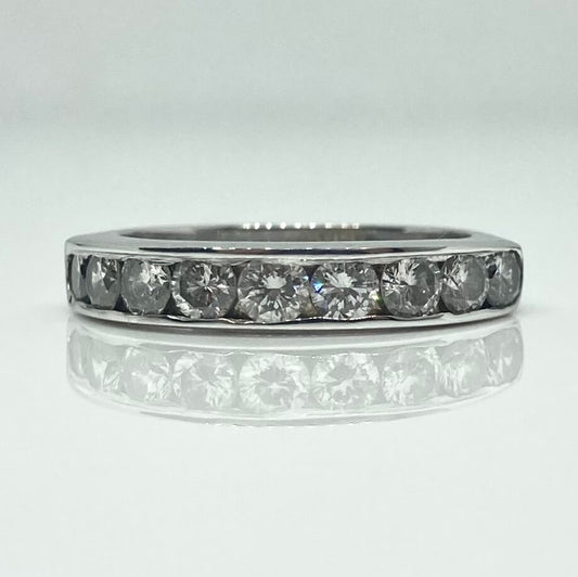 Pre-owned 14K channel set diamond wedding band