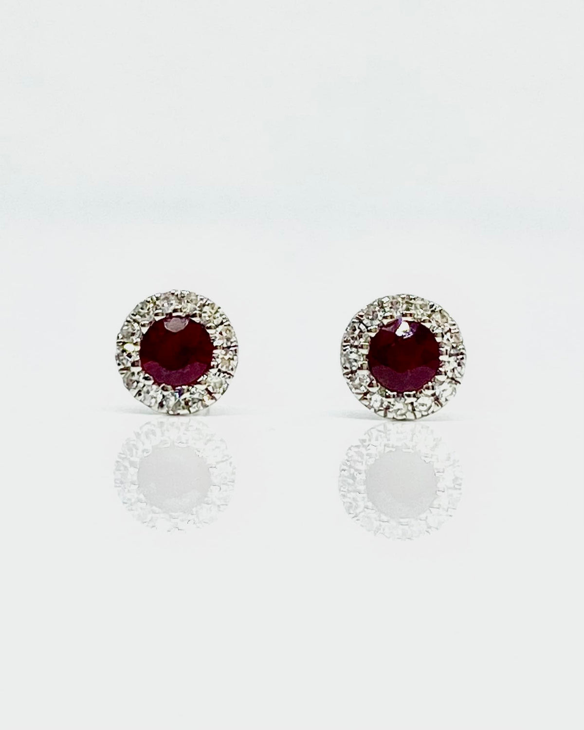 14K white gold ruby and diamond stud earrings