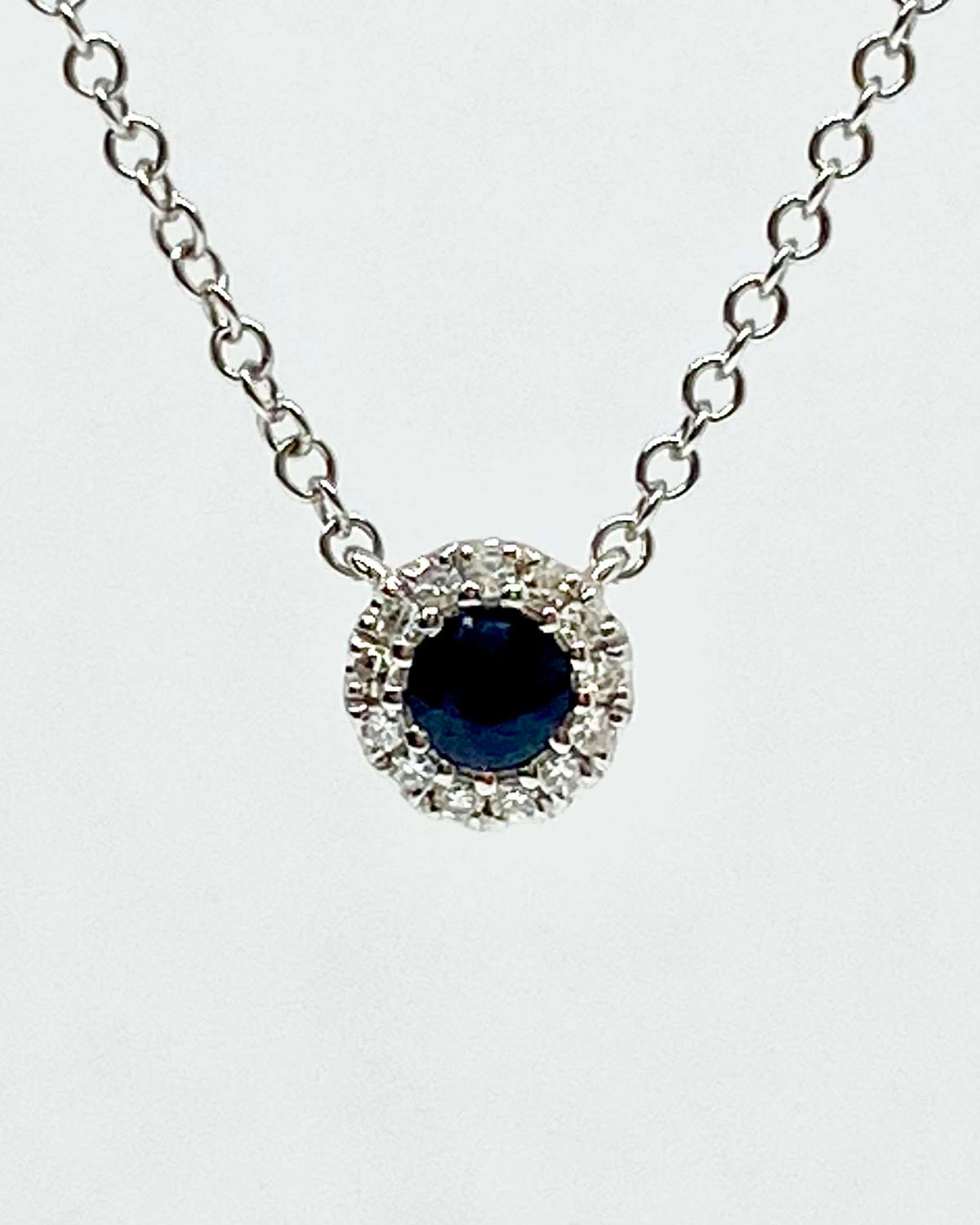 14K white gold sapphire and diamond halo pendant necklace