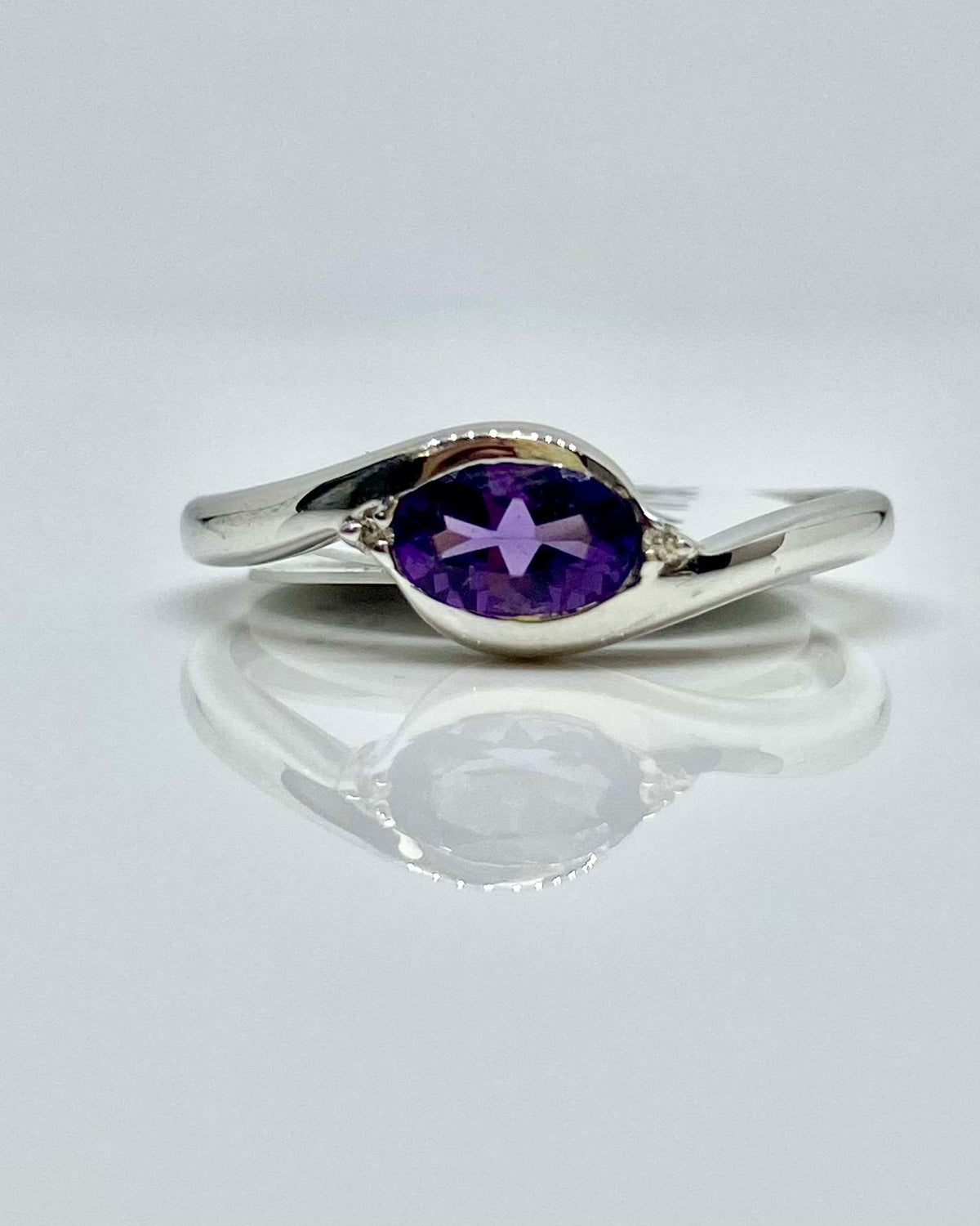 14K white gold oval amethyst and diamond ring