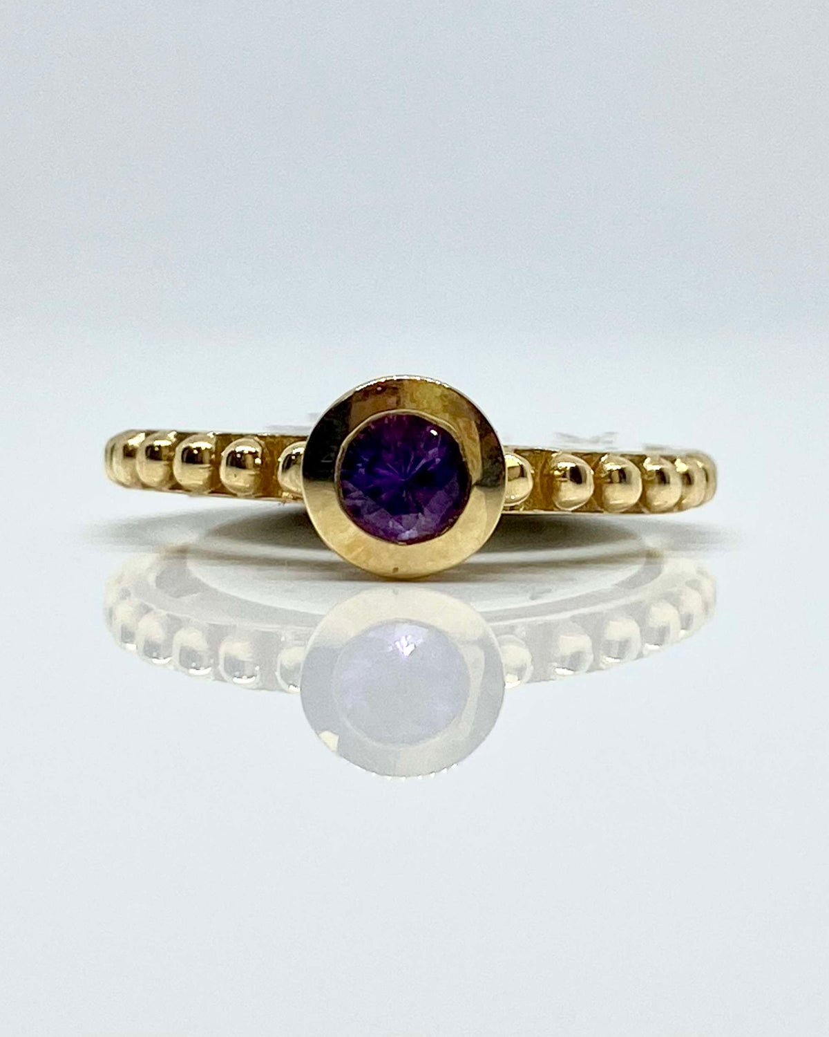 14K yellow gold bezel set amethyst ring