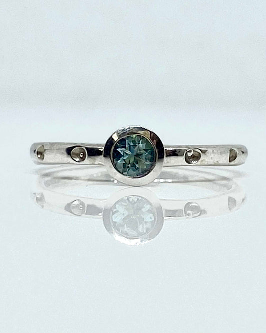 14K white gold bezel set blue topaz ring