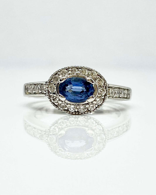 14K white gold oval blue sapphire ring with diamond halo