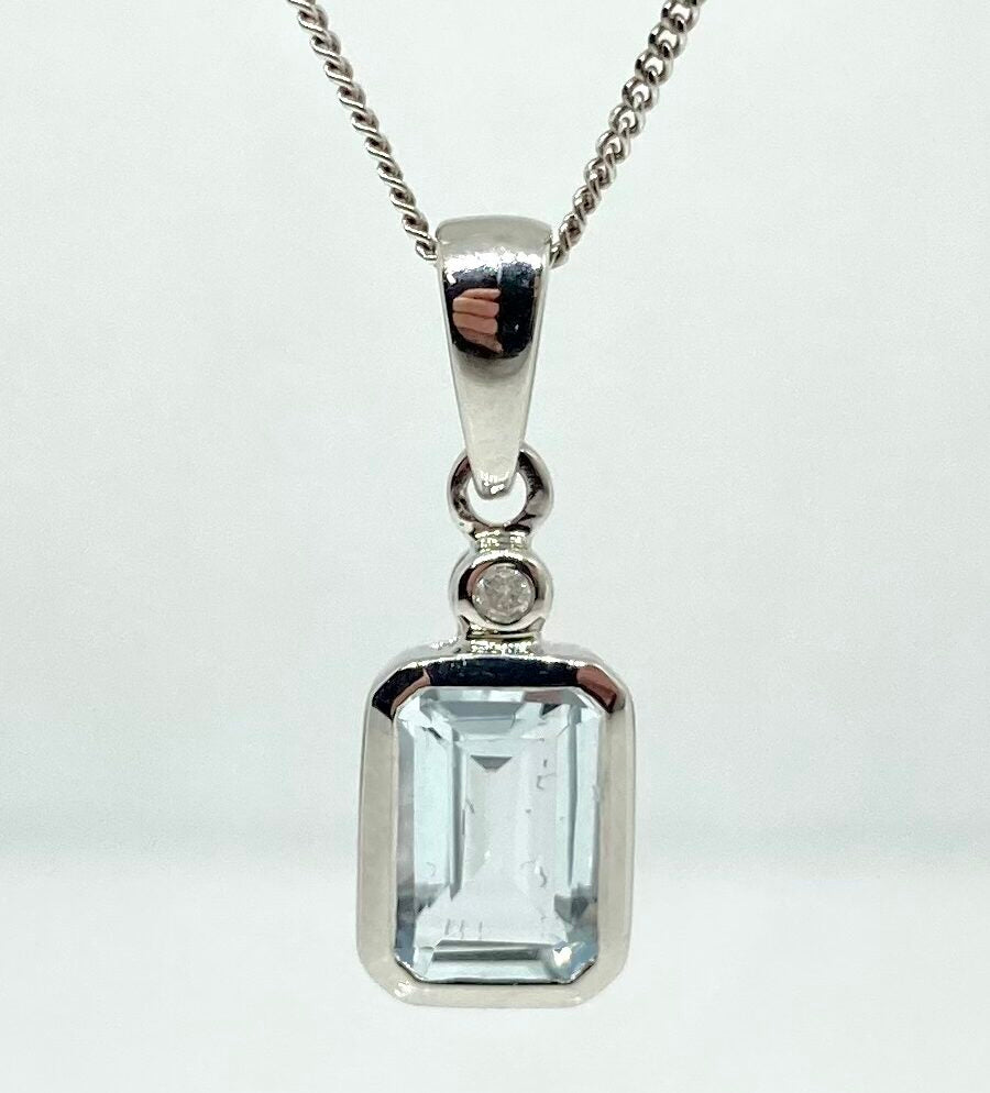 10K white gold aquamarine and diamond pendant