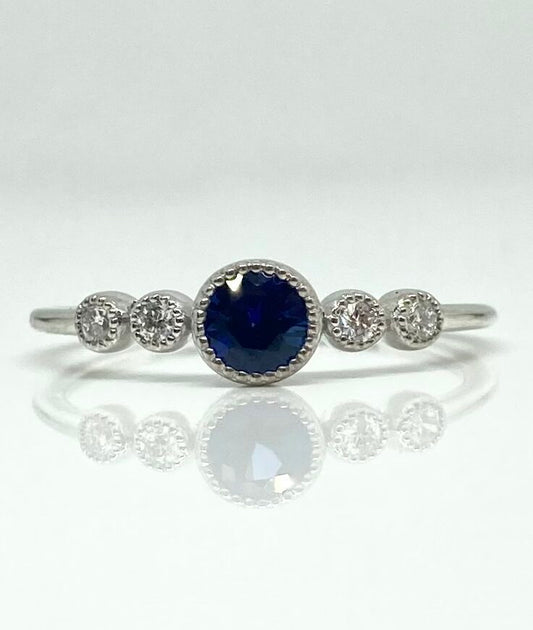 14K white gold sapphire ring with diamond accents
