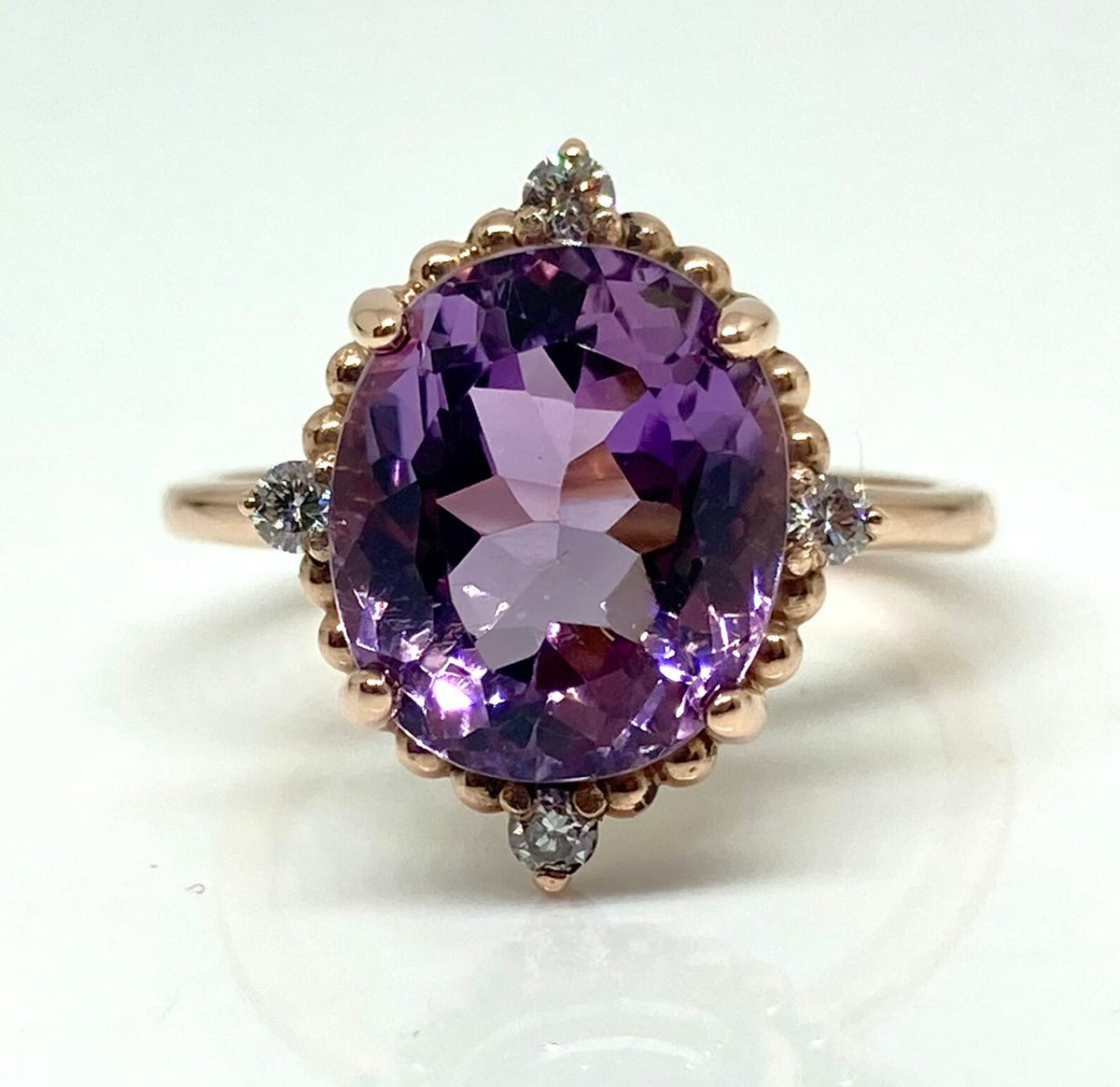14K gold kunzite ring with diamond accents