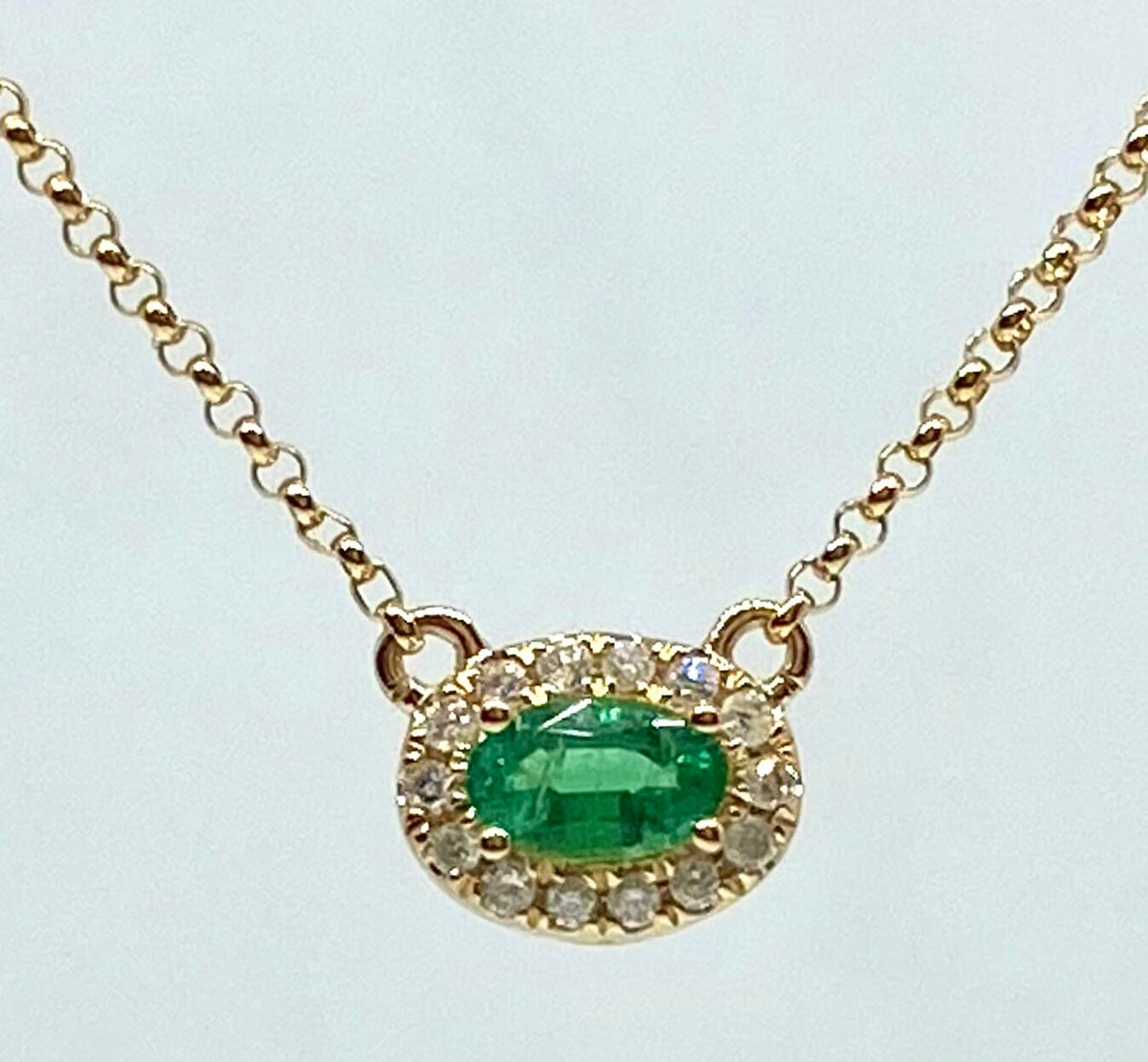 14K yellow gold emerald and diamond necklace