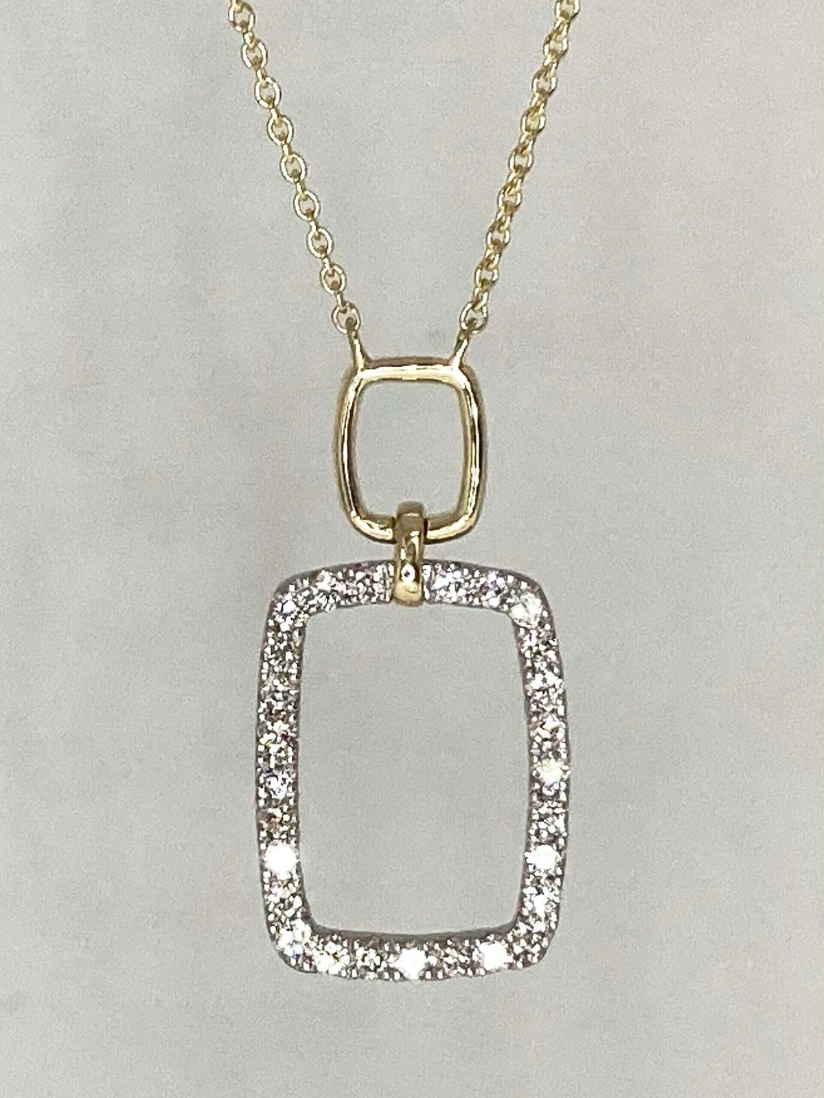 14K yellow gold and platinum diamond pendant